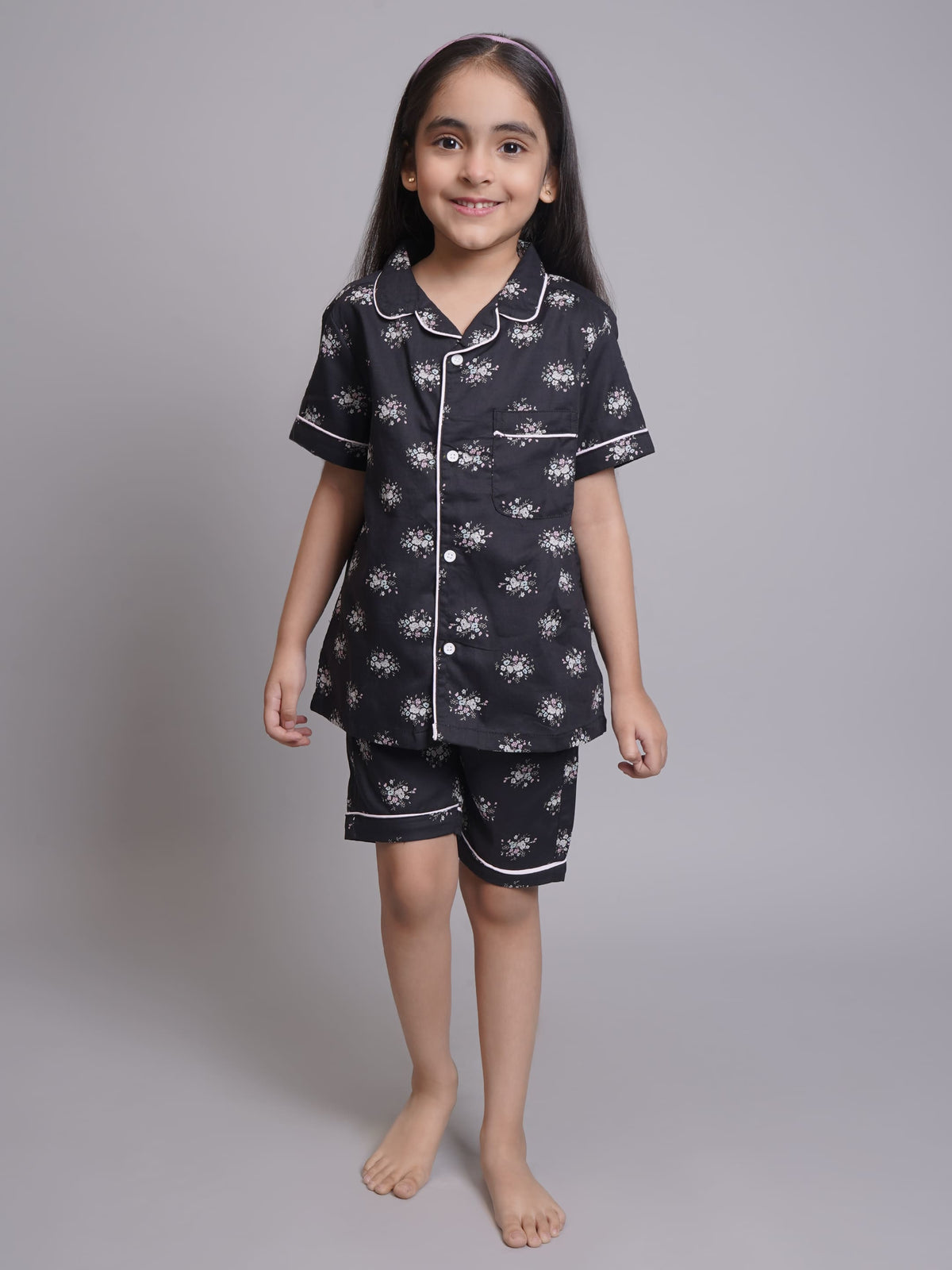 Pijamas de niña de manga corta con estampado floral