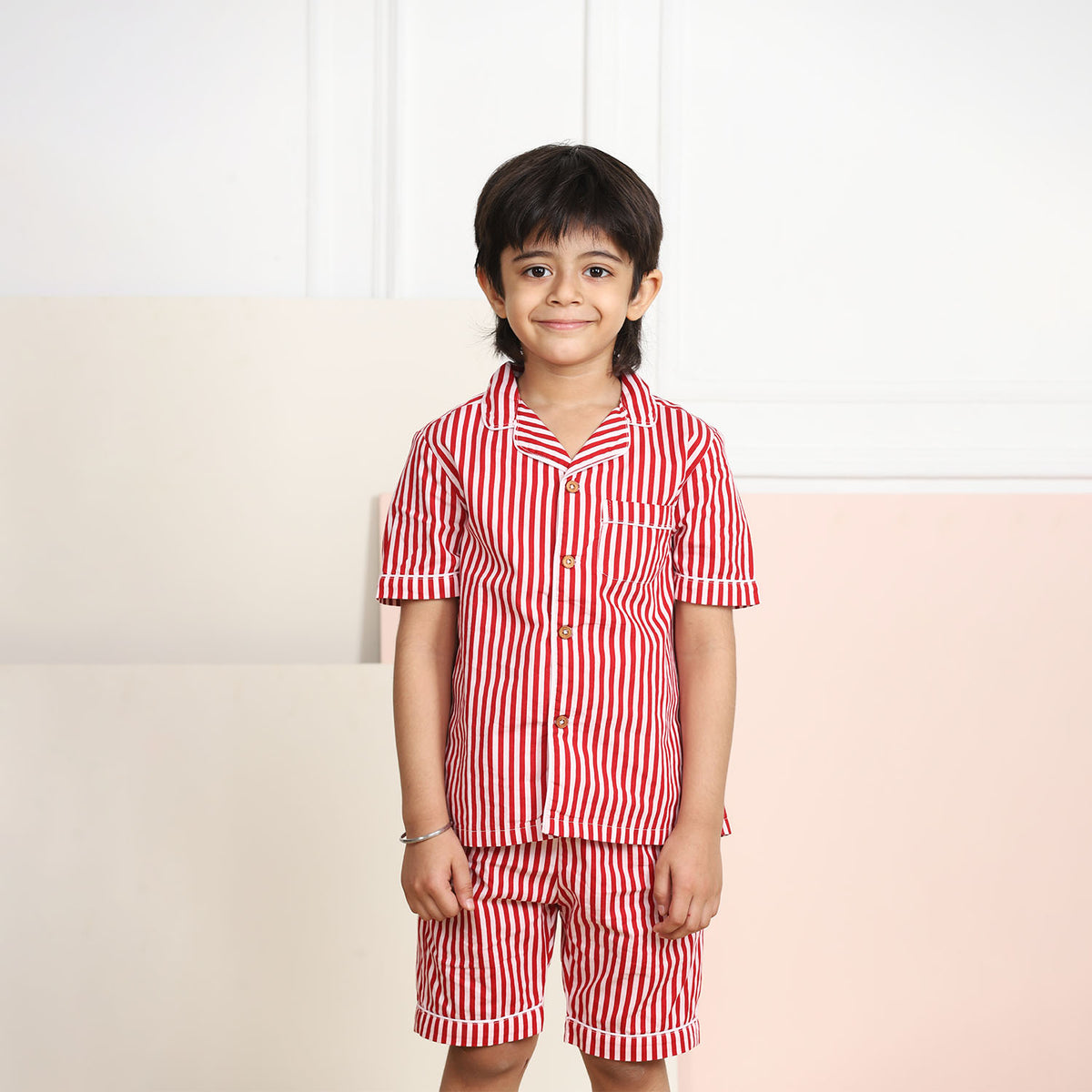 Monos de dormir unisex a rayas rojas con muescas